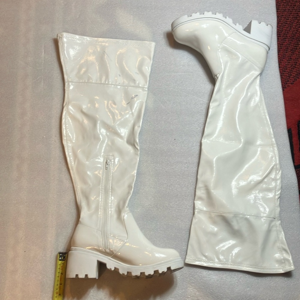 White patent lug sole over the knee boots size 11.